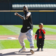 Kanye West and his son Saint throw out a ceremonial first pitch before the game between the Chicago White Sox and the Chicago Cubs on Sept. 23, 2018 in Chicago, Illinois.